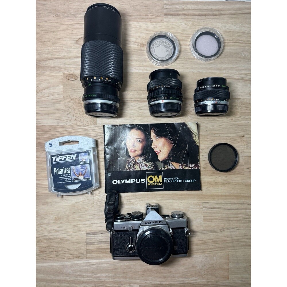 Olympus OM-2 35mm SLR Film Camera with 50 mm lens + 35-70 mm + 65-200mm TESTED